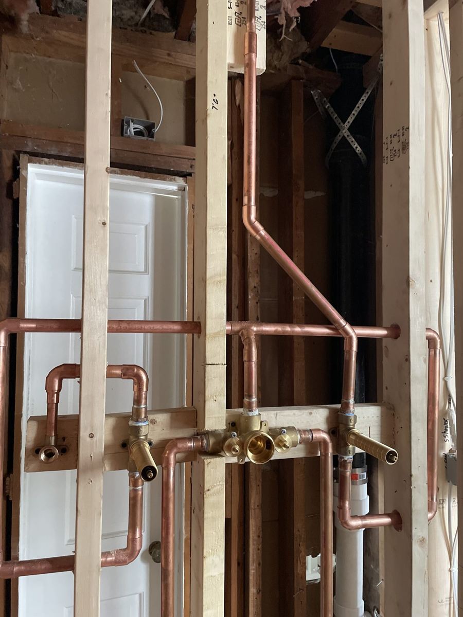Clean copper rough-in plumbing by Good Help Plumbing